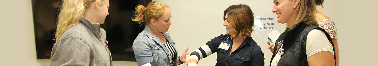 Photo of students learning how to splint